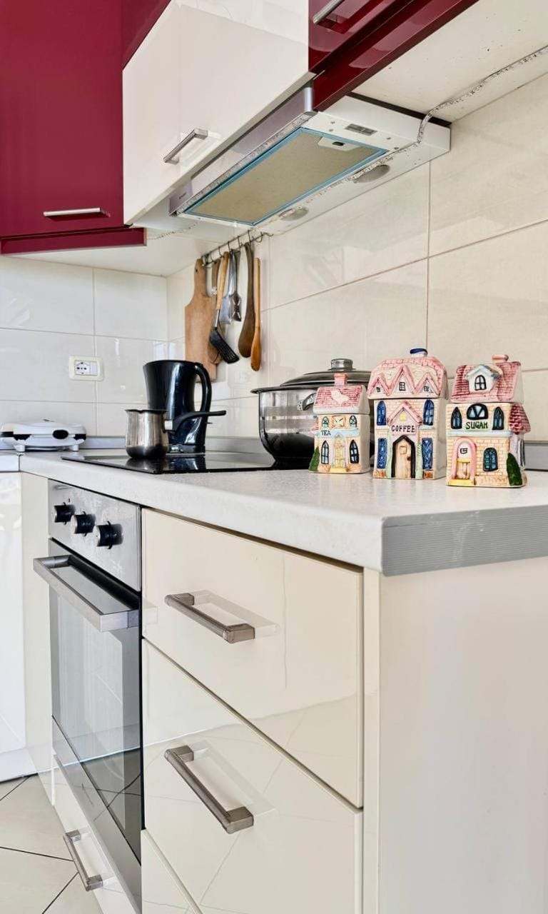 Kitchen or kitchenette, stove, toaster