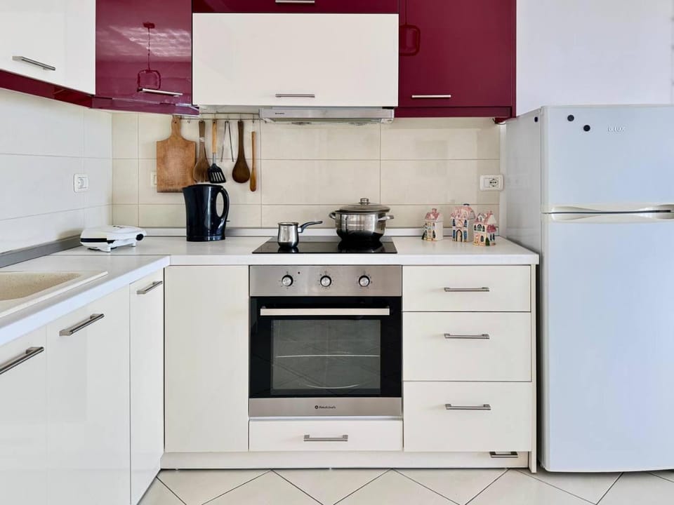 Kitchen or kitchenette, oven, stove