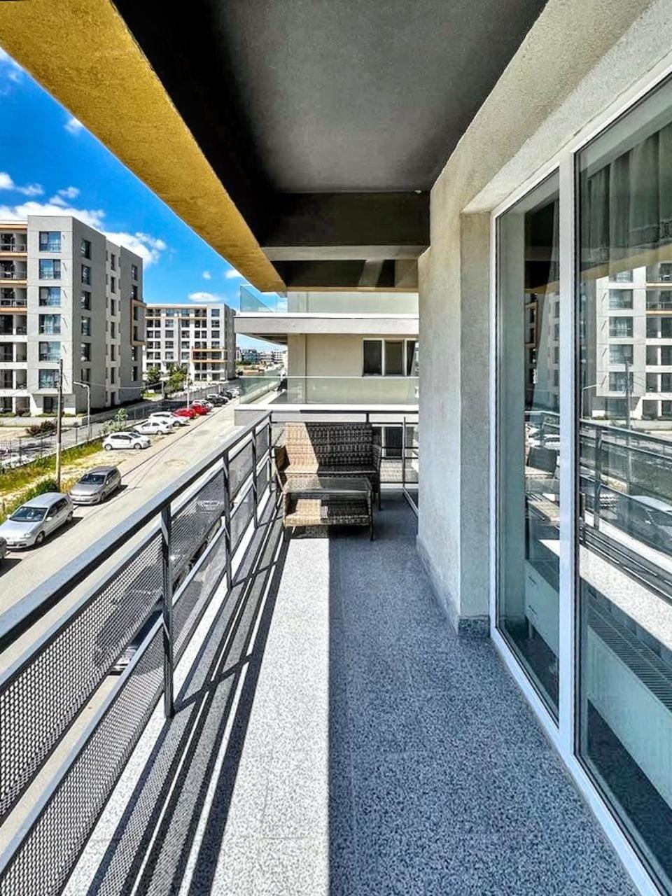 Property building, Patio, Day, View (from property/room), Balcony/Terrace, Living room, Seating area, Parking