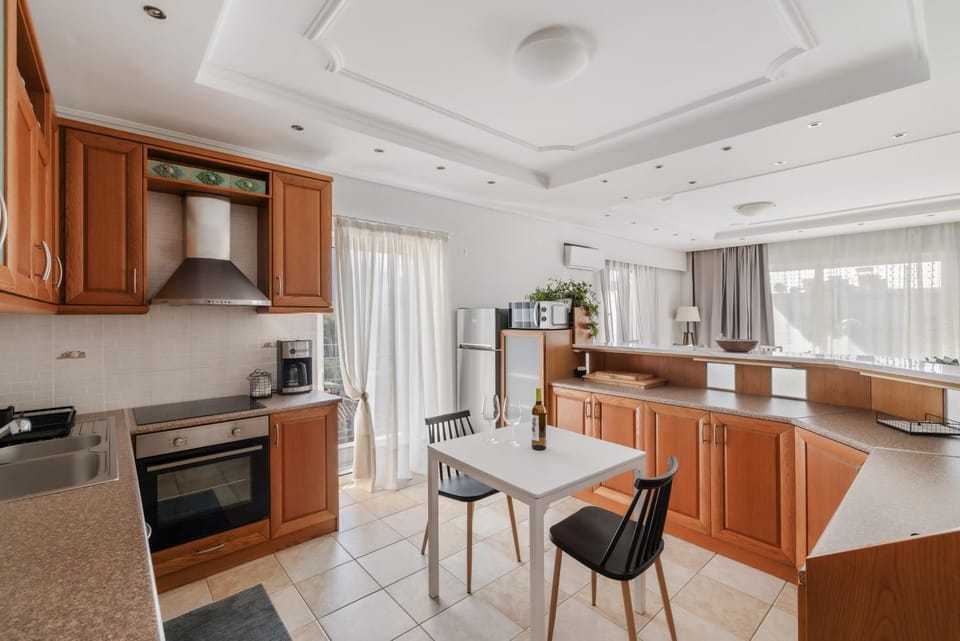 Kitchen or kitchenette, dishwasher, oven, stove
