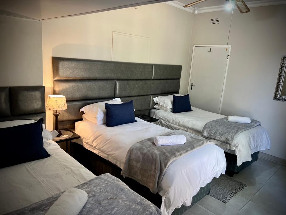 Bed, Photo of the whole room, Bedroom, towels, air conditioner