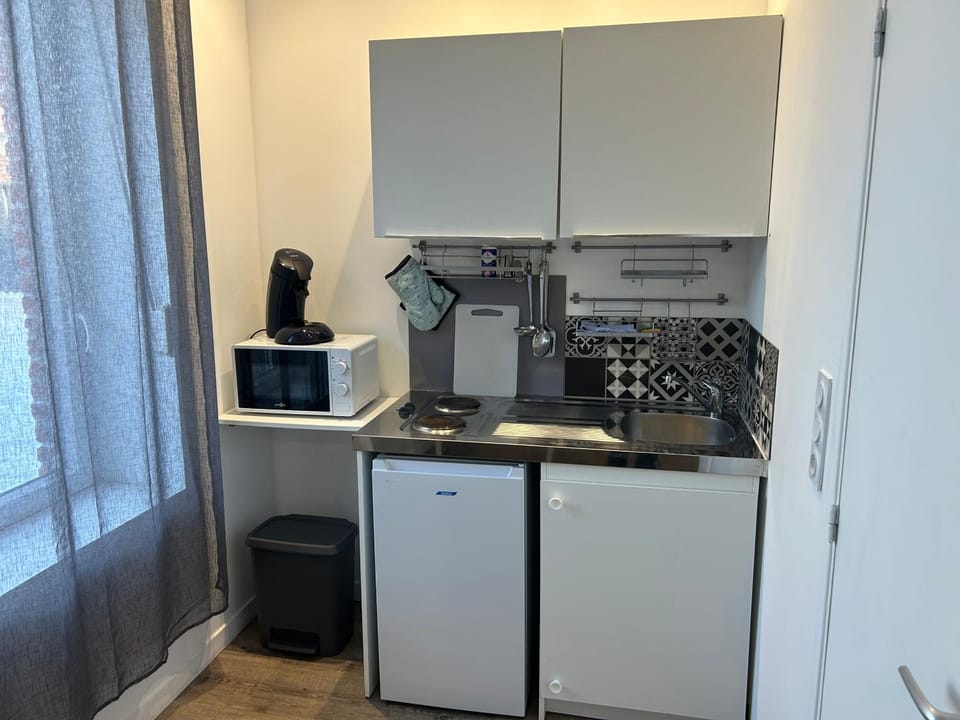 Kitchen or kitchenette, stove