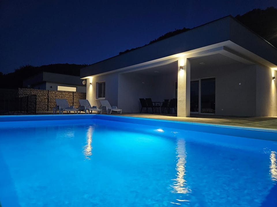 Property building, Night, Pool view, Swimming pool
