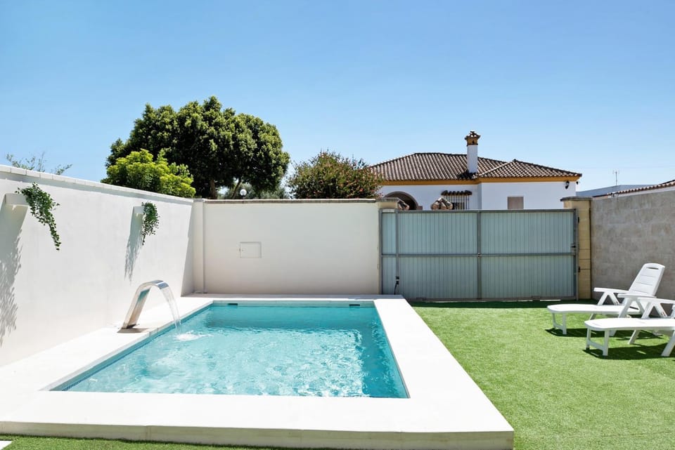 Property building, Living room, Swimming pool