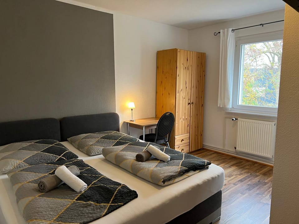 Bed, Photo of the whole room, Seating area, Bedroom, Quiet street view, heating, towels, wardrobe