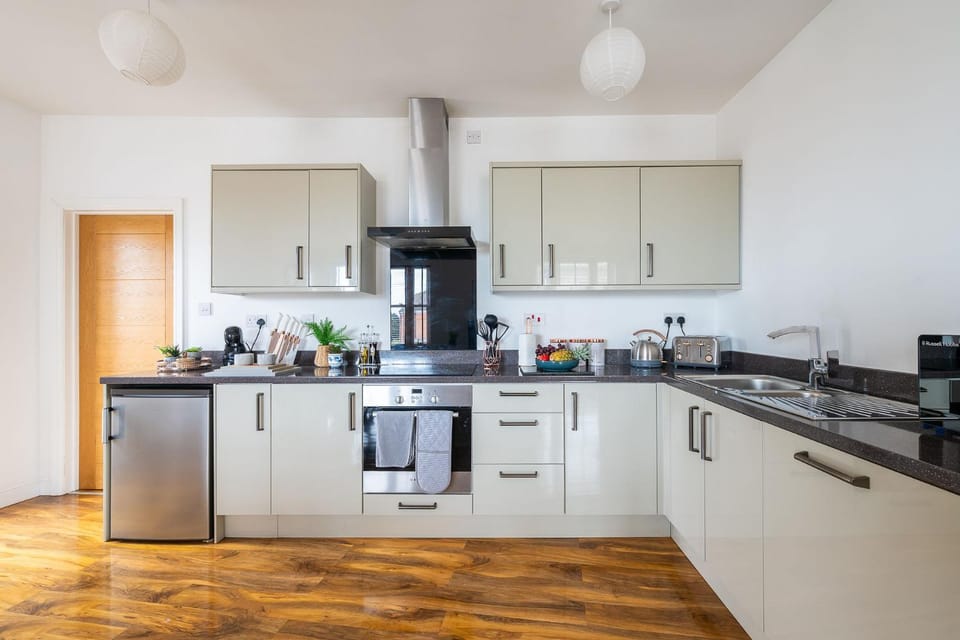 Kitchen or kitchenette, microwave, oven, stove, toaster