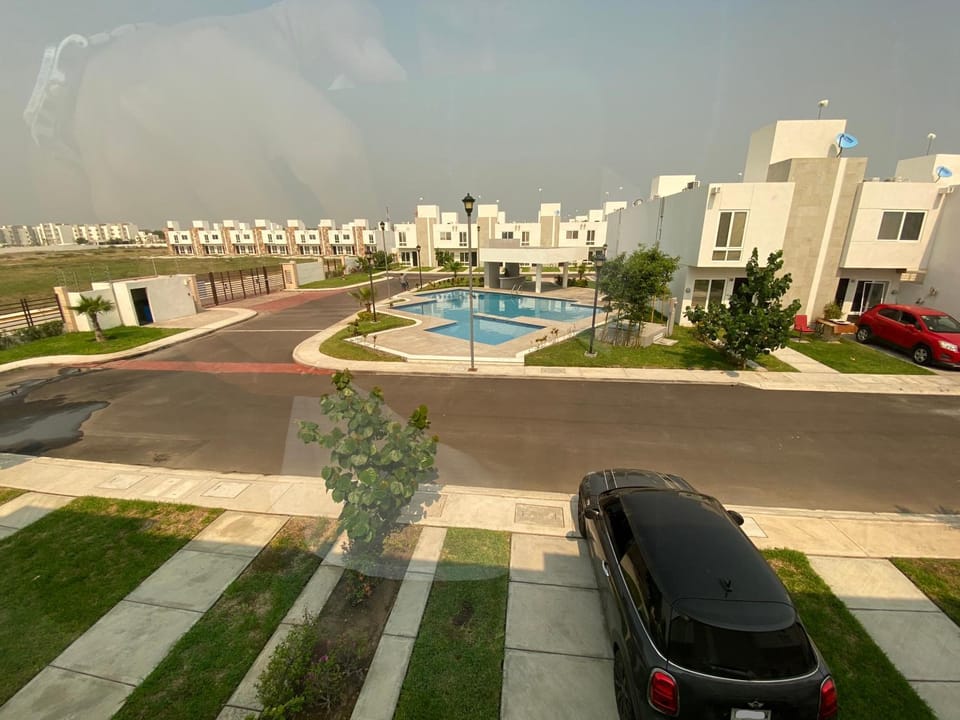 Property building, Day, Neighbourhood, Bird's eye view, Pool view, Street view, Swimming pool, Swimming pool, Location, Parking