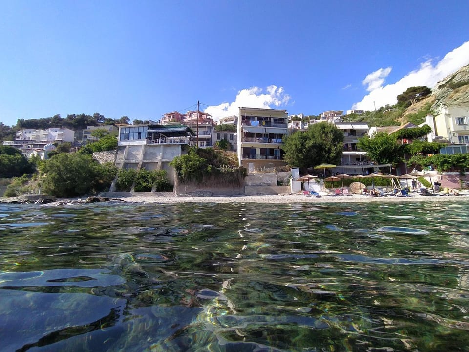 Property building, Nearby landmark, Neighbourhood, Beach