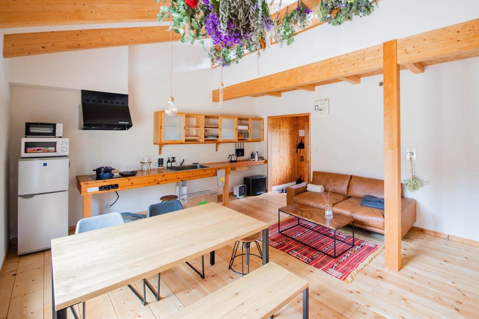 Living room, Dining area, microwave, stove, toaster, kitchen