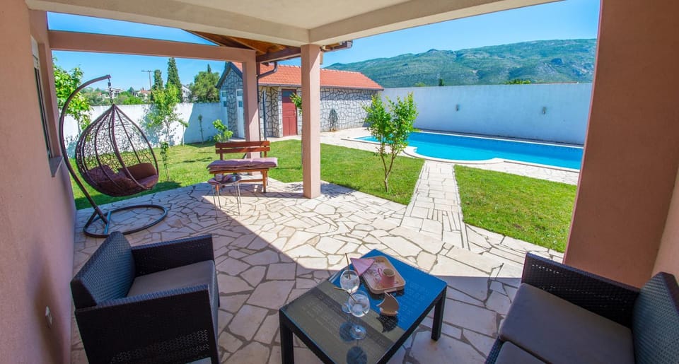 Patio, Seating area, Pool view, Swimming pool
