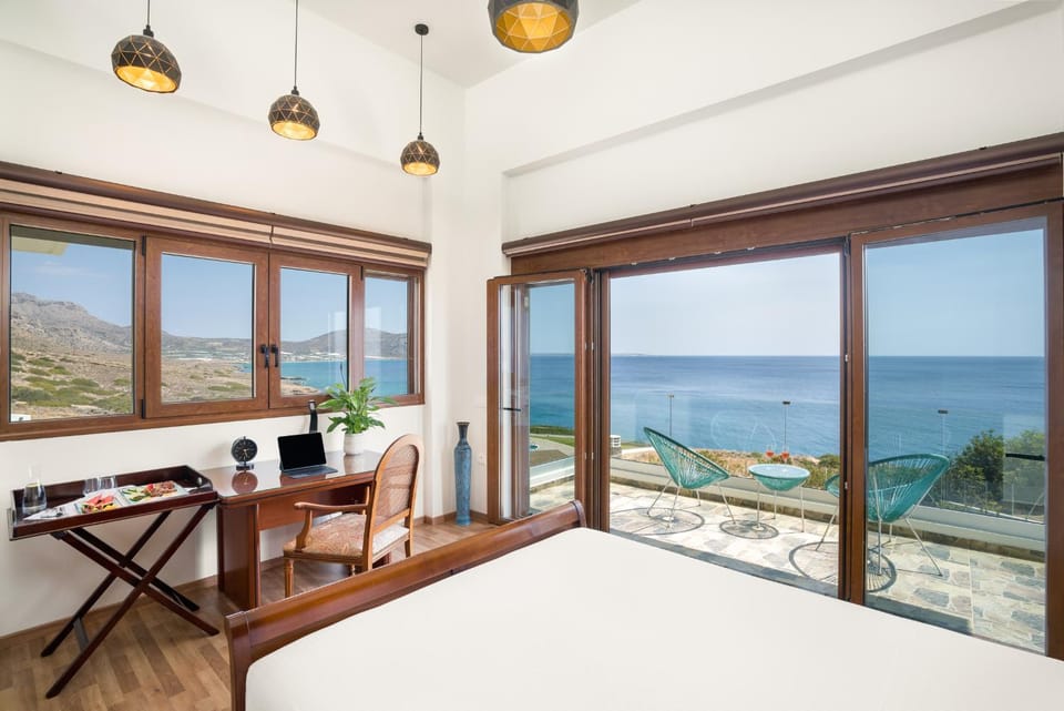 Bed, Natural landscape, View (from property/room), Pool view, Sea view