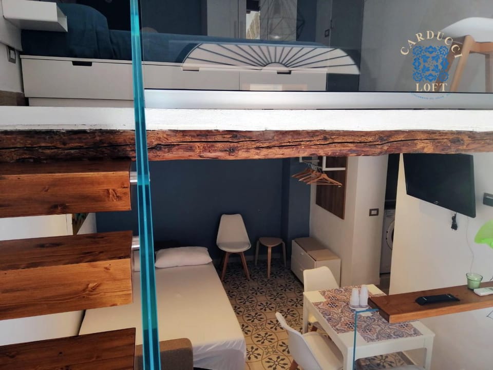 Bed, Living room, Seating area