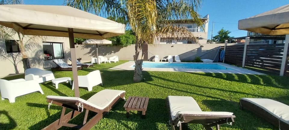 Patio, Natural landscape, Garden, Solarium, Swimming pool, sunbed