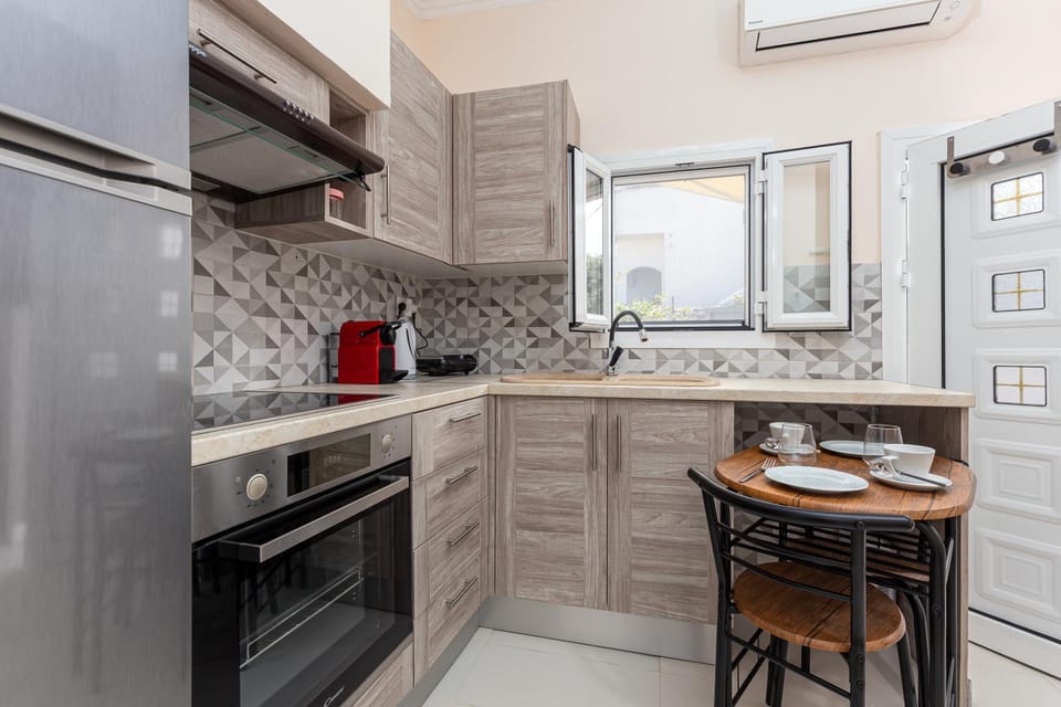 Kitchen or kitchenette, oven, stove, toaster