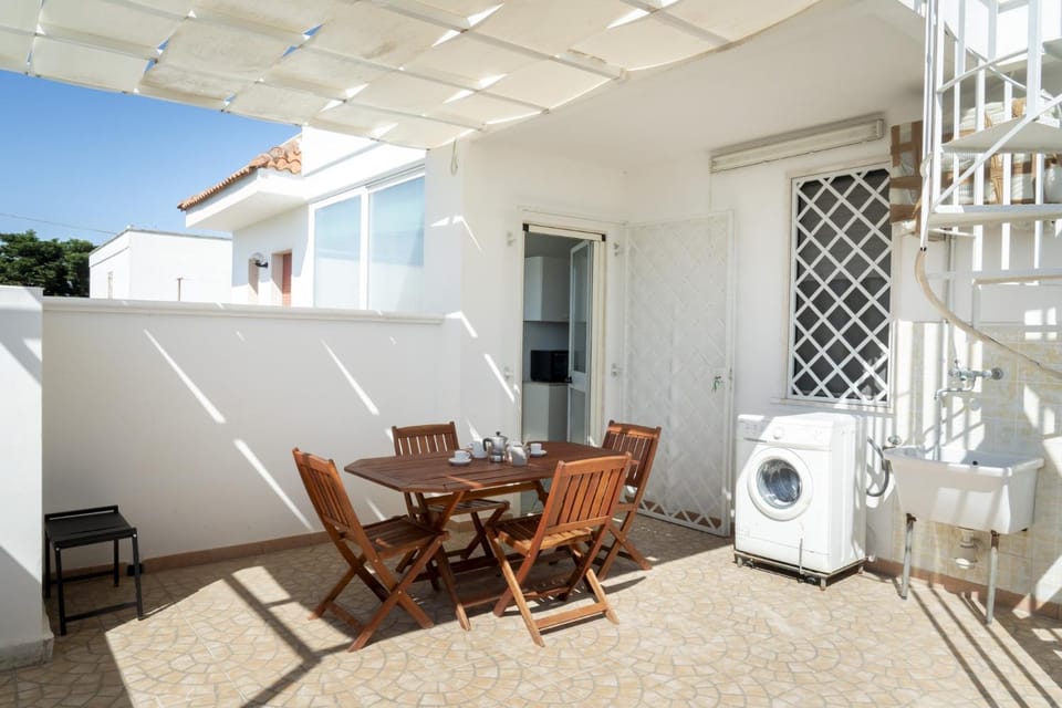 Casa La Spiaggia by ThePuglia Apartment in Torre Lapillo