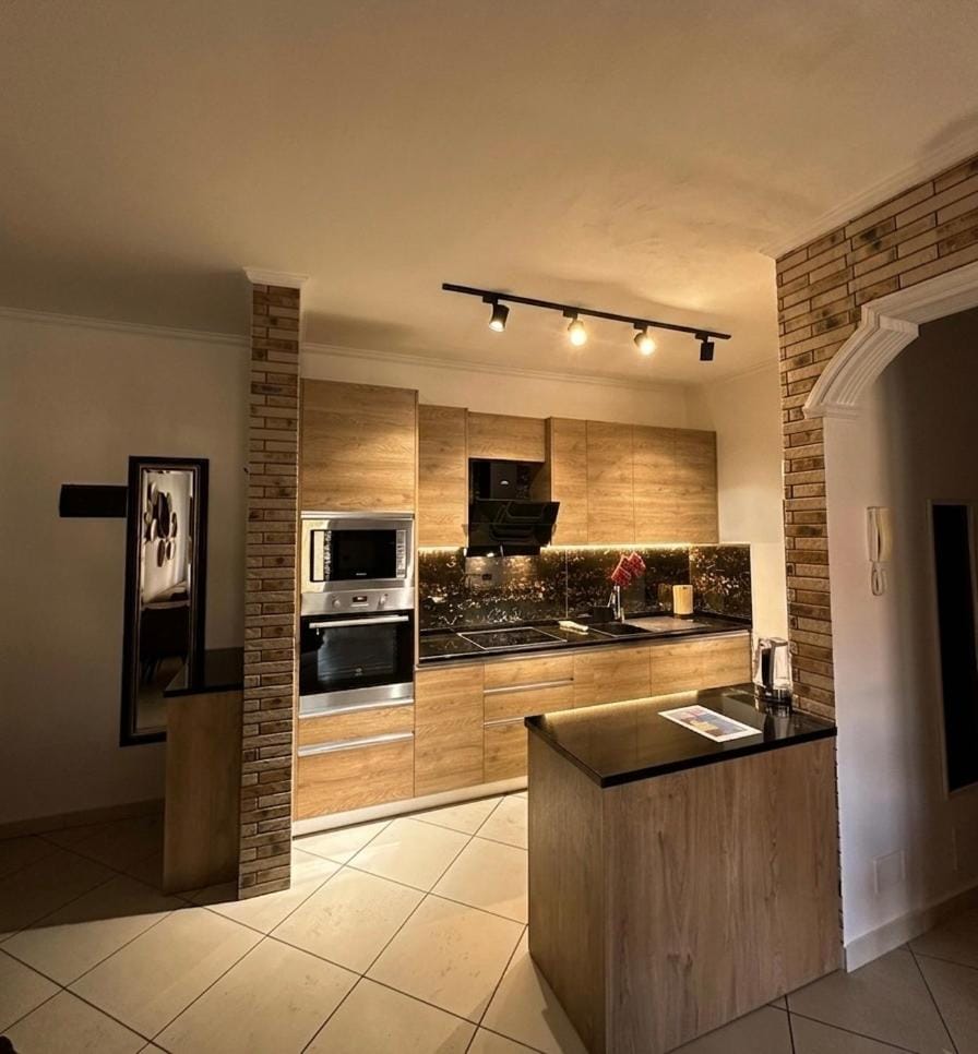 Kitchen or kitchenette, oven, stove