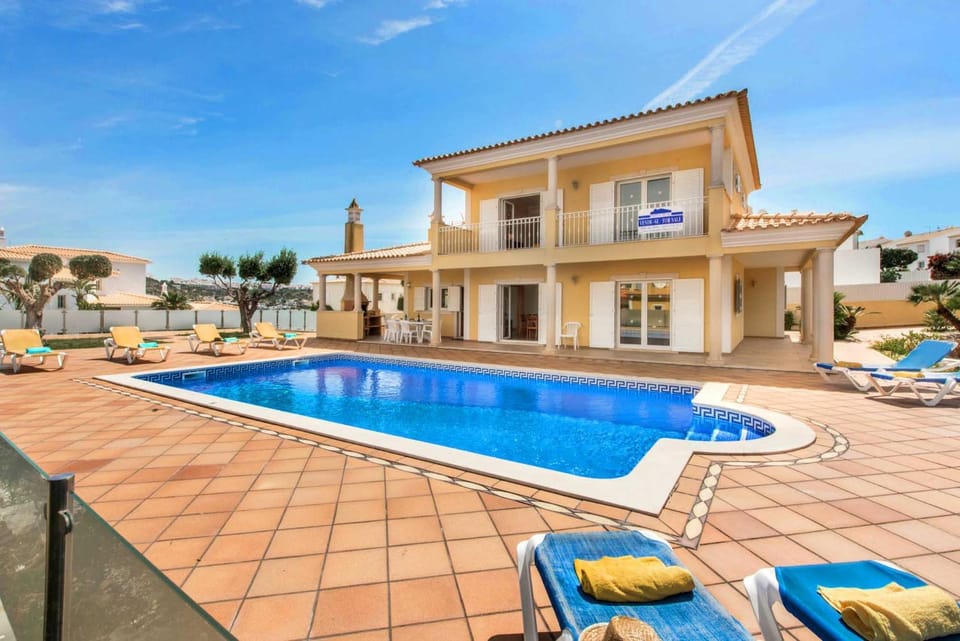 Property building, Day, Pool view, sunbed