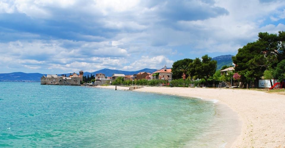 Nearby landmark, Day, Neighbourhood, Natural landscape, Beach, Mountain view, Sea view