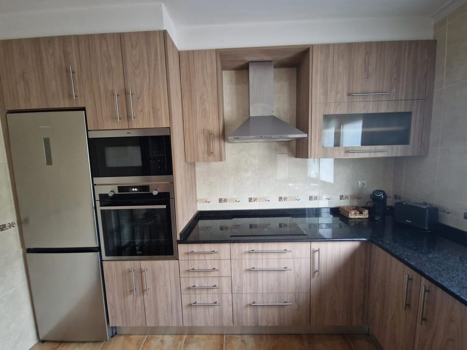 Kitchen or kitchenette, stove