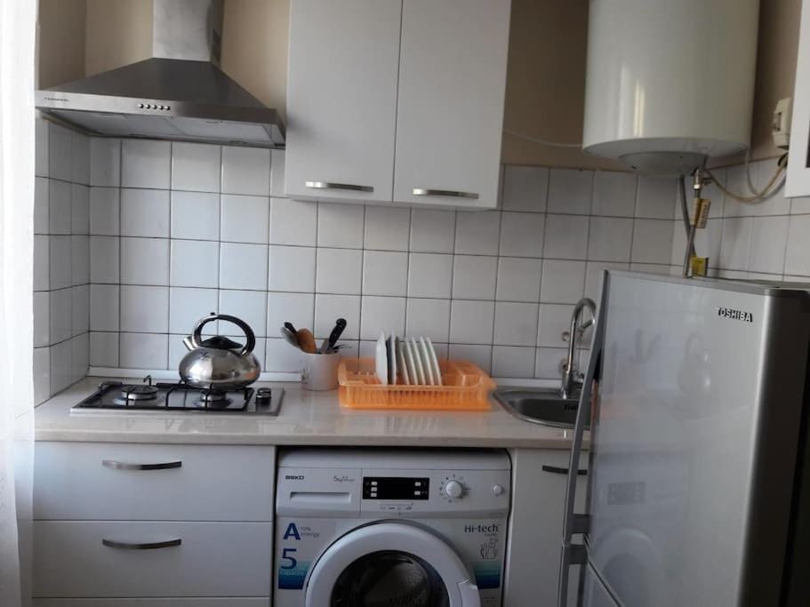 Kitchen or kitchenette, washing machine