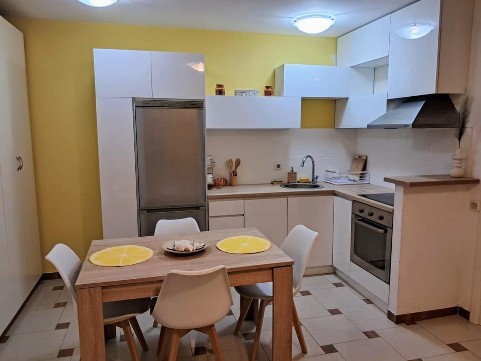 Dining area, dishwasher, oven, stove, kitchen