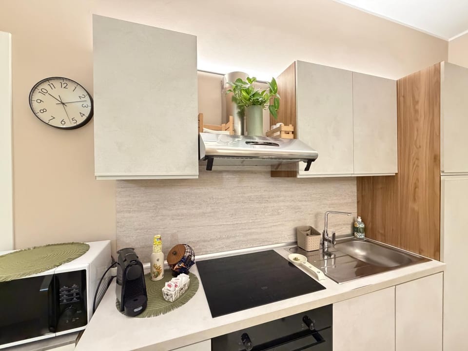 Kitchen or kitchenette, stove