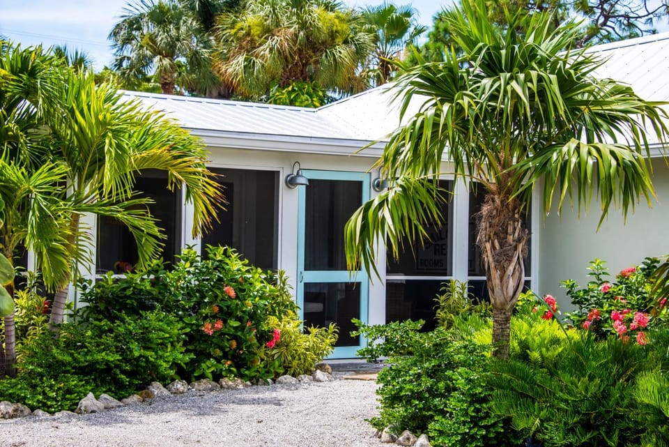 Island Time: AMI North End, Pool, Close to City Pier & Pine Ave by Anna Maria Life Vacation Rentals House in Anna Maria Island