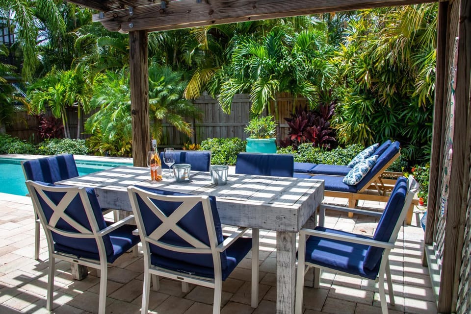 Island Time: AMI North End, Pool, Close to City Pier & Pine Ave by Anna Maria Life Vacation Rentals House in Anna Maria Island