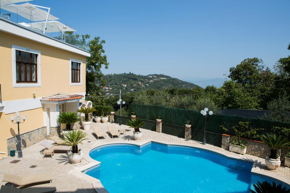 Patio, Spring, Day, Natural landscape, Mountain view, Pool view, Swimming pool, sunbed