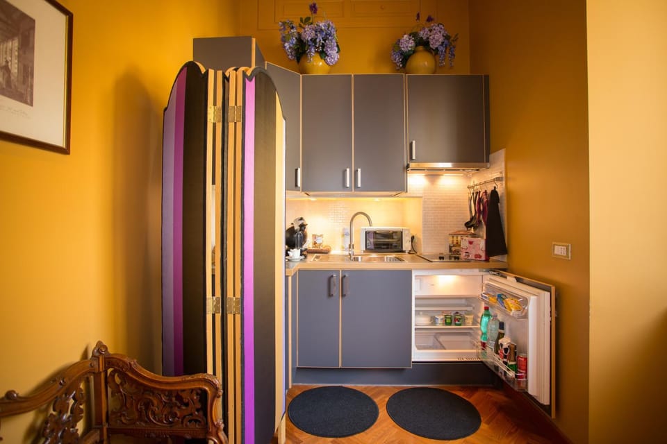 Bed, People, Kitchen or kitchenette