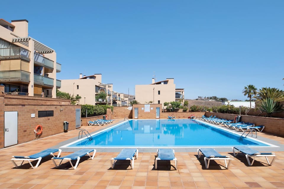 Property building, Living room, Swimming pool