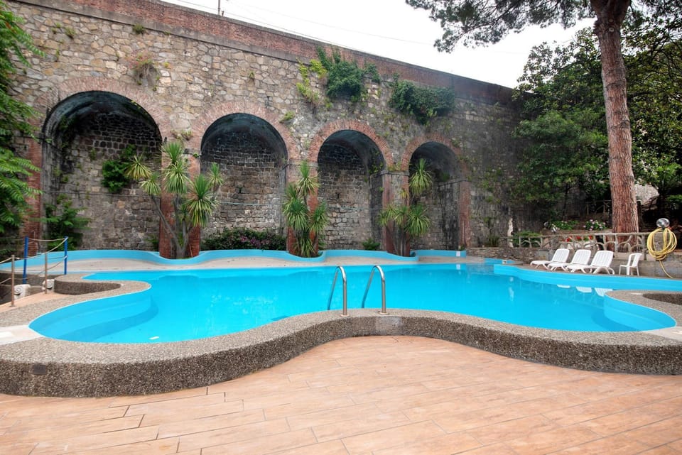 Property building, Living room, Swimming pool