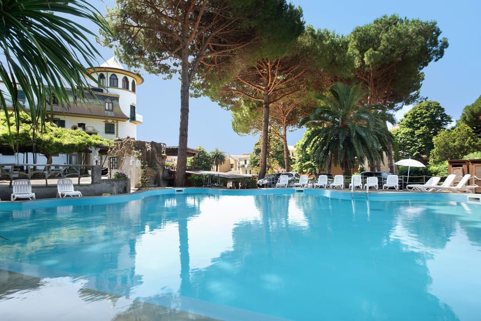 Property building, Living room, Swimming pool