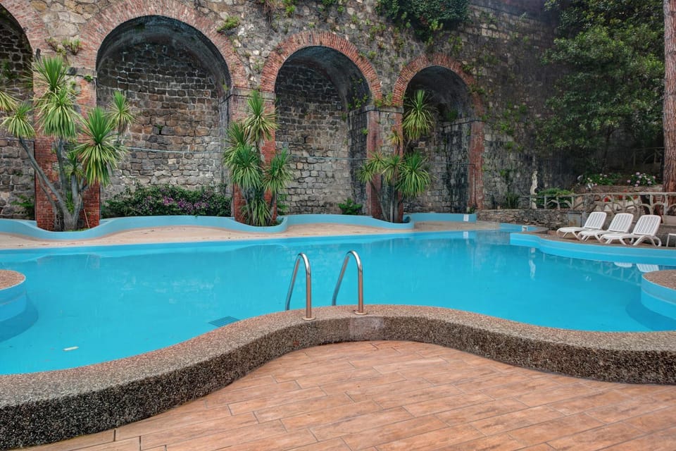 Property building, Living room, Swimming pool