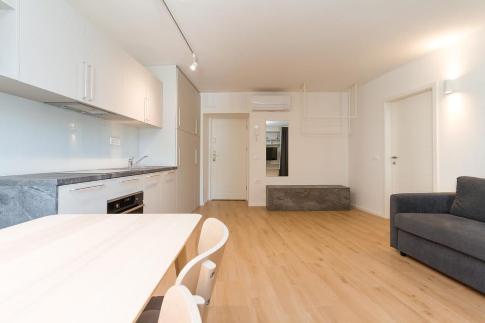 Kitchen or kitchenette, Living room, Seating area, Dining area