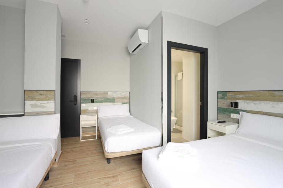 Bed, Photo of the whole room, Bedroom, towels, air conditioner