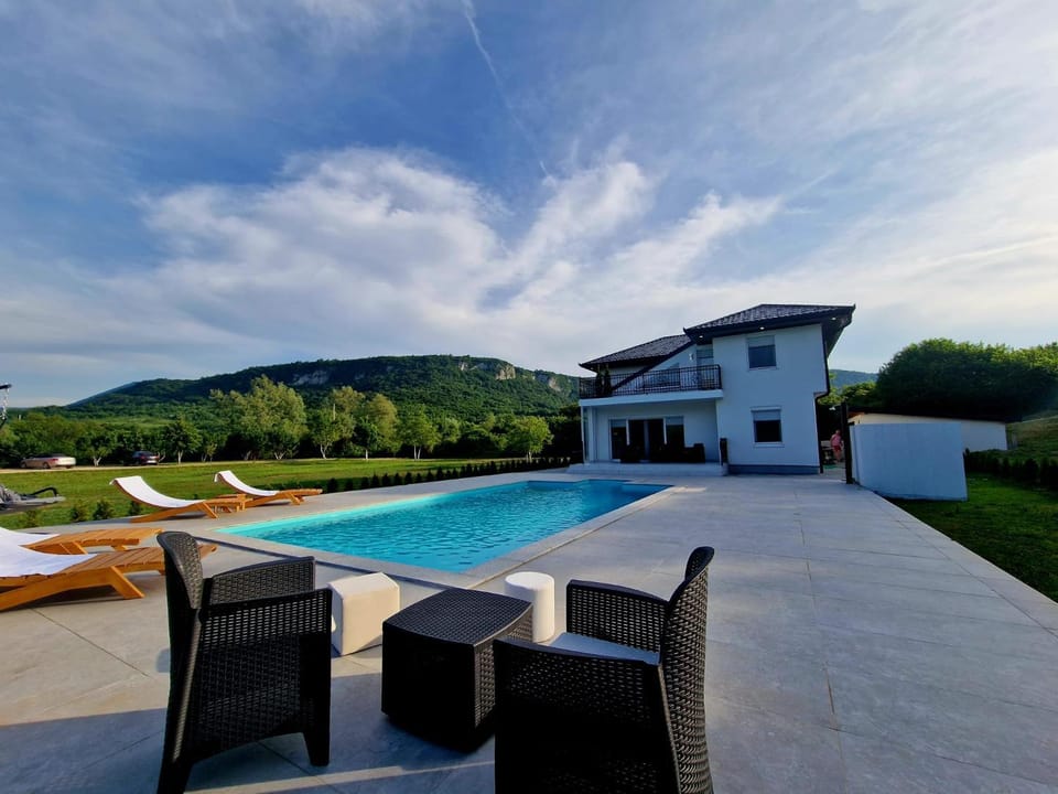 Property building, Patio, Pool view, Swimming pool