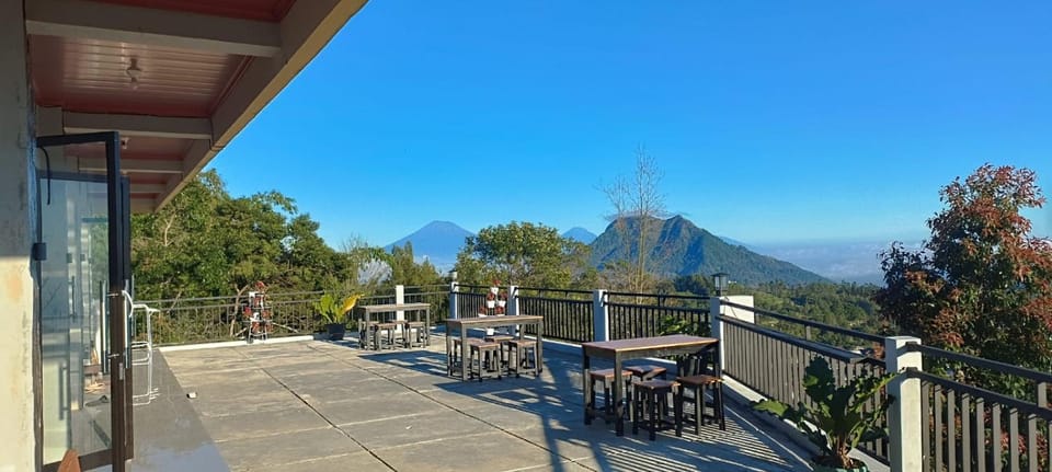 Property building, Patio, Day, Natural landscape, View (from property/room), Balcony/Terrace, Seating area, Dining area, Landmark view, Mountain view
