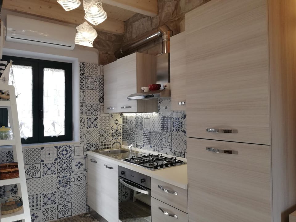 Kitchen or kitchenette, oven, stove