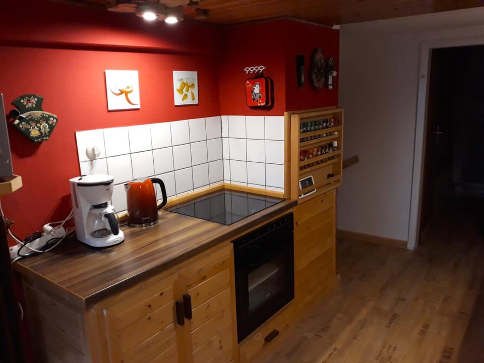 Kitchen or kitchenette, stove, kitchen