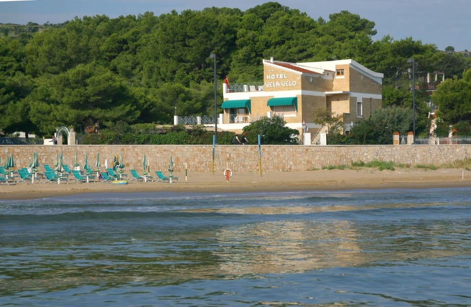 Property building, Nearby landmark, Day, Natural landscape, Beach, Sea view