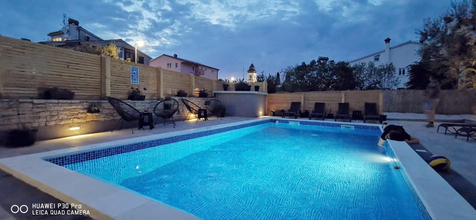 Night, Pool view, Swimming pool, sunbed