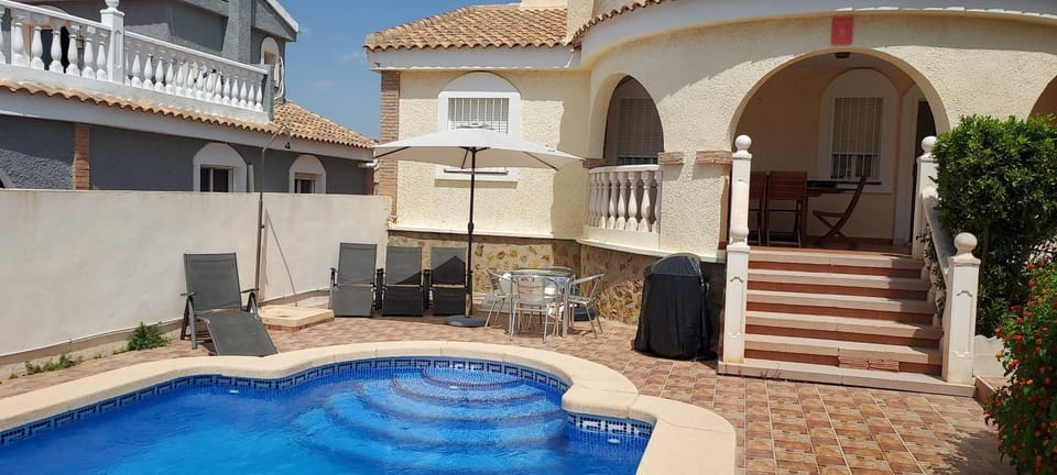 Patio, Day, Pool view, Swimming pool, sunbed