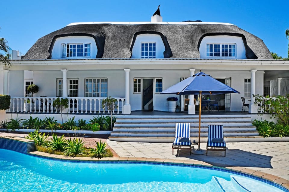 Property building, Swimming pool, Swimming pool, sunbed