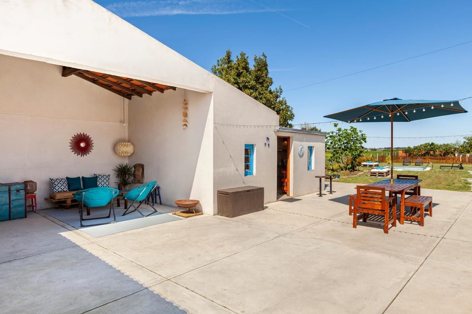 Property building, Patio, Garden, Dining area, Garden view, Pool view