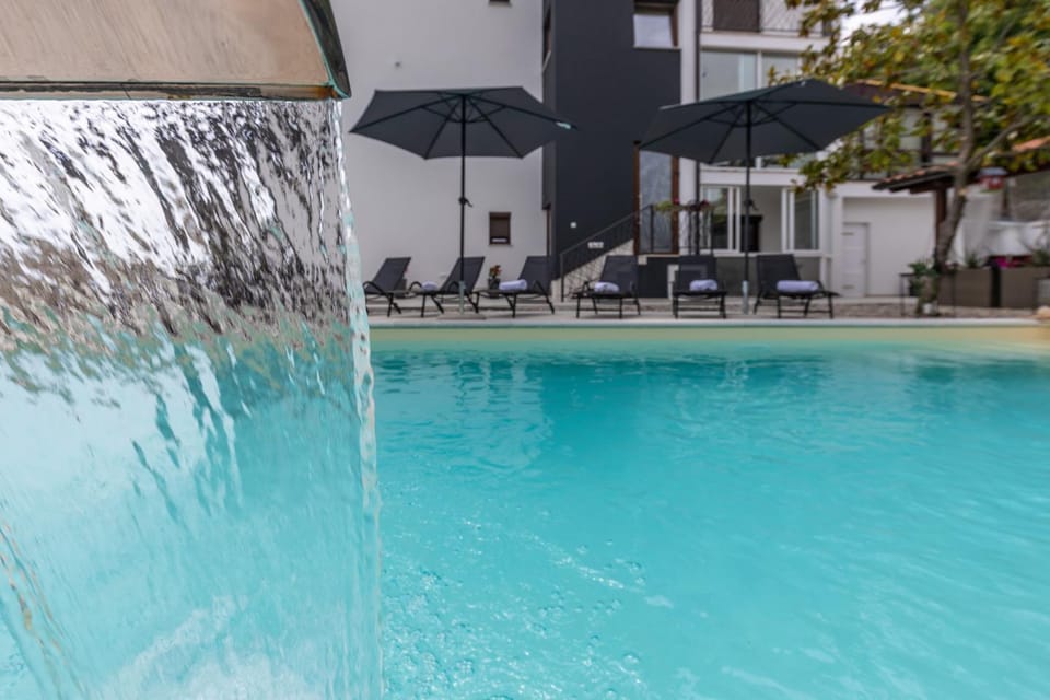 Property building, Patio, Day, Pool view, Swimming pool, sunbed