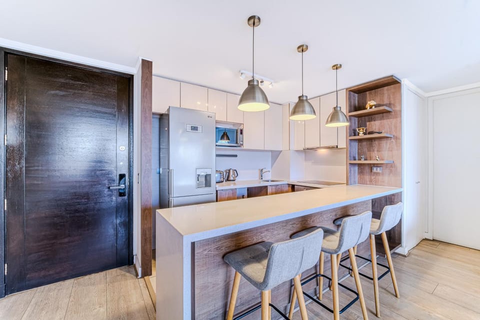 Citadel View 2BR Balcony & Parking Apartment in Las Condes