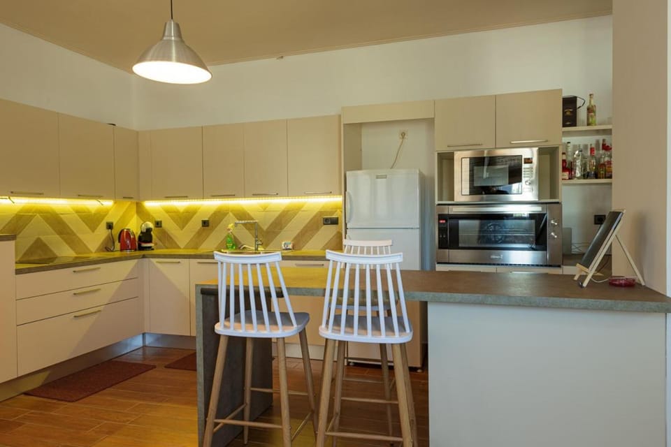 Dining area, dishwasher, oven, stove, kitchen