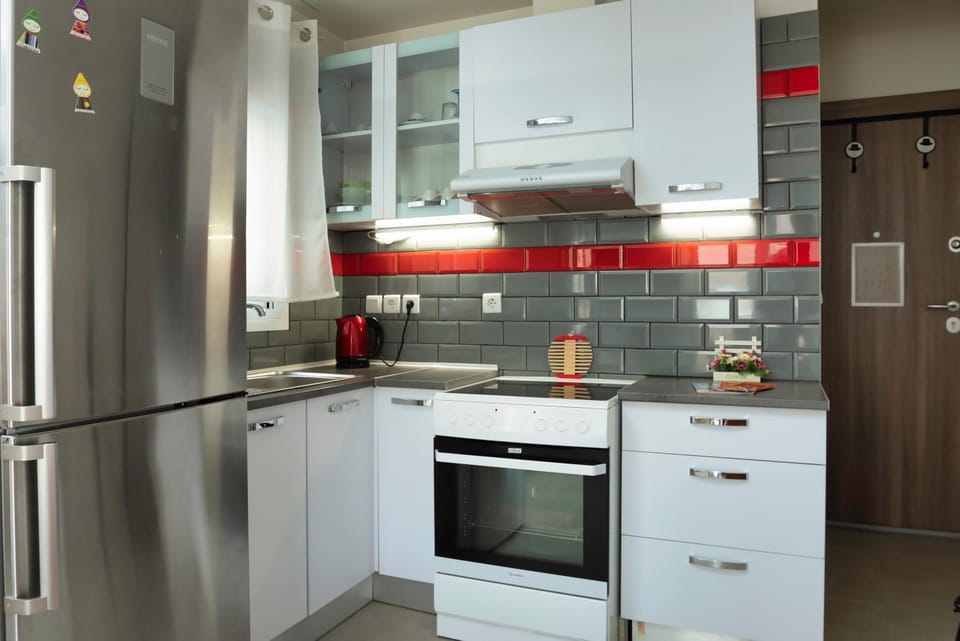 Kitchen or kitchenette, oven, stove, toaster