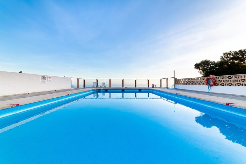 Property building, Living room, Swimming pool